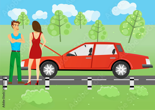 man and woman standing near a car