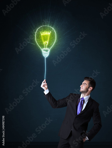 Businessman with an idea bulb