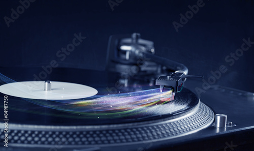 Music player playing vinyl music with colourful abstract lines