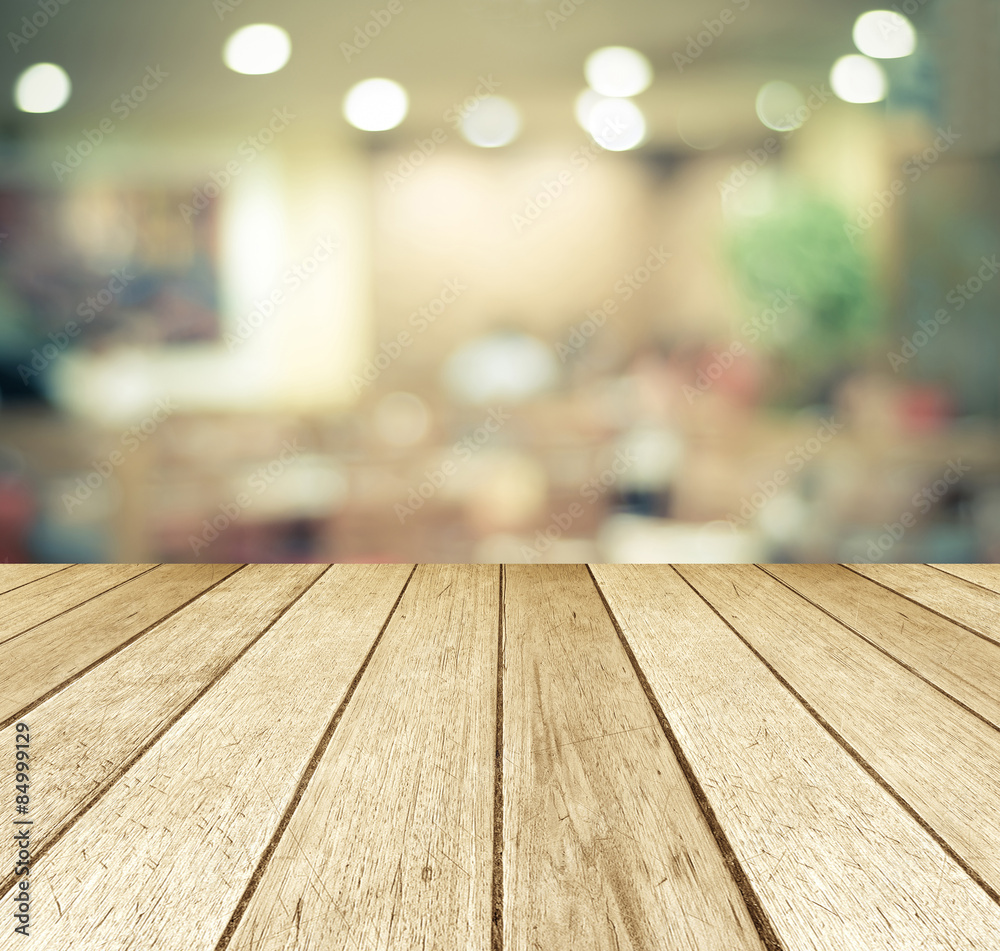 Perspective wood over blurred restaurant with bokeh background Perspective wood over blurred restaurant with bokeh background