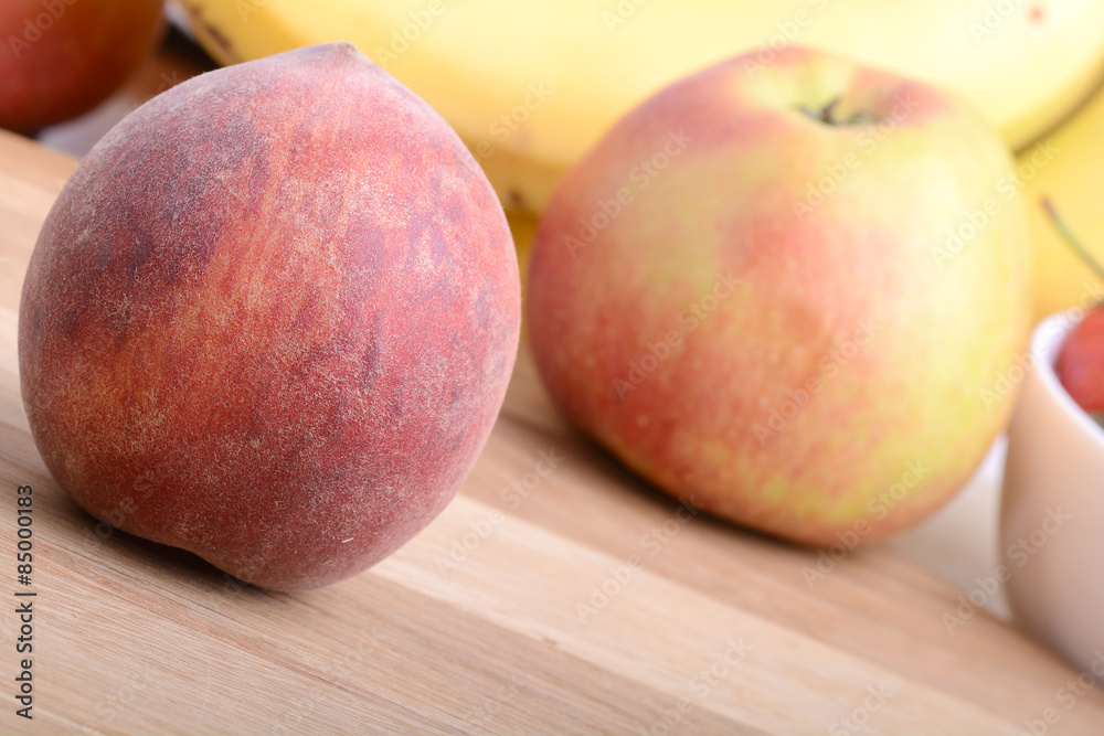 fruits on wodden table, peach, apple, bananas, food concept fruits on wodden table, peach, apple, bananas, food concept