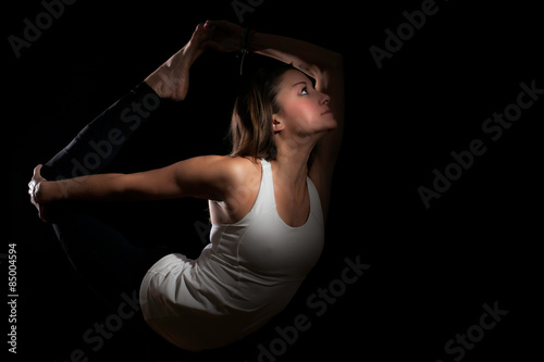 Yoga Natarajasana Variation Dancer Pose Color photo