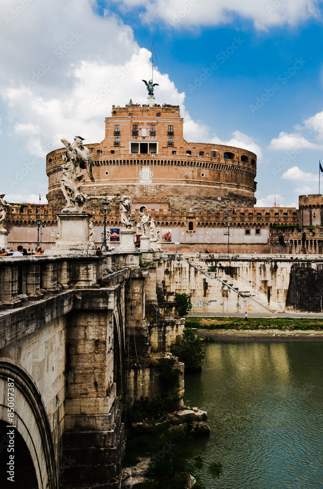 front view of Saint Anegel castle from the other bank of tevere river, on the left side view of the Saint Angel bridge. Rome
