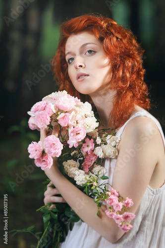 Romantic portrait of a beautiful redhead woman