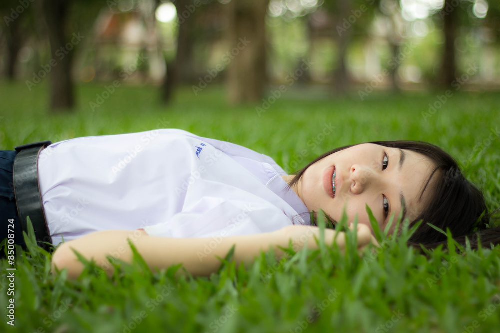 thai student teen relax Sitting On Park