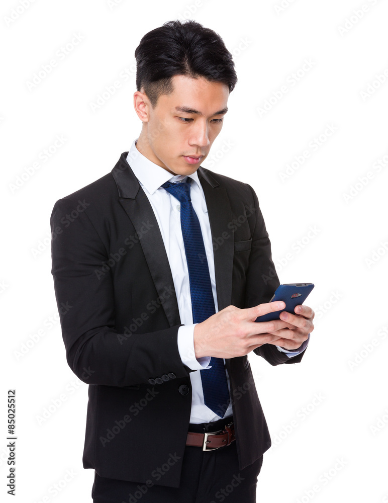 Young businessman check the email on cellphone Young businessman check the email on cellphone