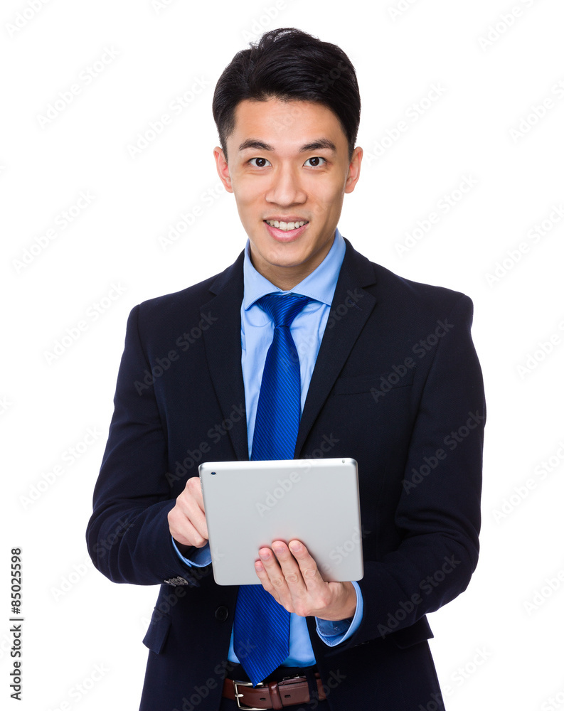 Asian businessman use of digital tablet Asian businessman use of digital tablet