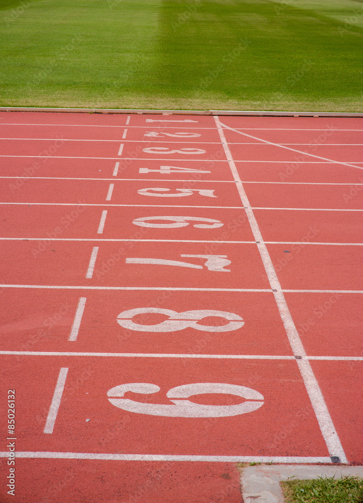 Fototapeta premium Numbers on running track in stadium