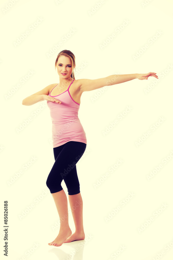 Young woman doing aerobic exercise.