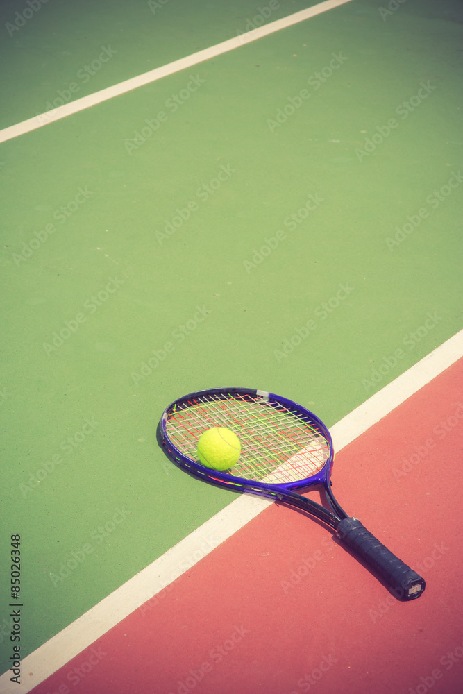 tennis racket and balls on the tennis court vintage color
