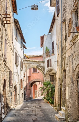 Pretty street in the ancient city of Tuscany © pitrs