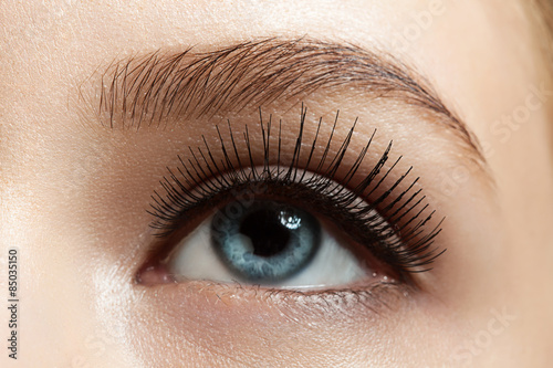 Fototapeta Naklejka Na Ścianę i Meble -  Close-up of make-up eye with long eyelashes