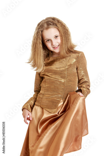 Fashionable girl in long satin dress photo