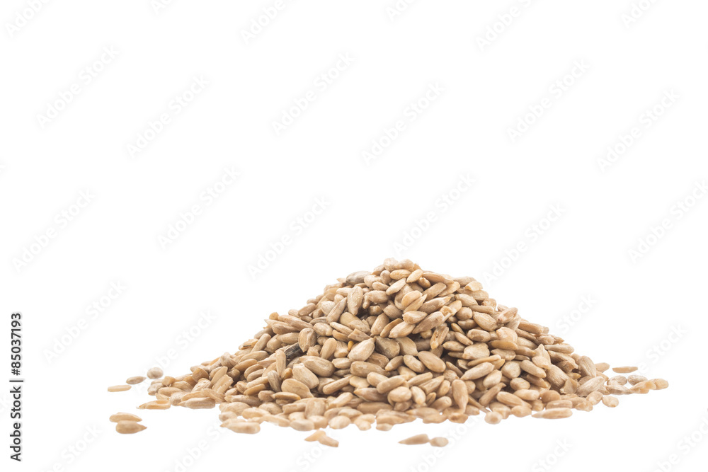 Pile of black sunflower seeds isolated on white background