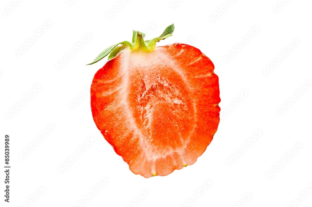 One half of strawberry isolated on a white background One half of strawberry isolated on a white background