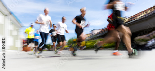 People in running competition