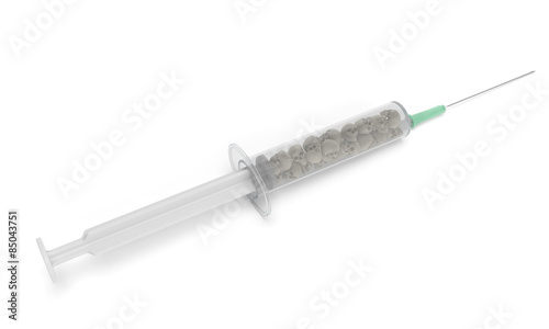 Syringe with skulls as symbol of social problem of euthanasia (mercy killing) or injection of dangerous deathful narcotic or administration large dose of potent drug (overdose) photo