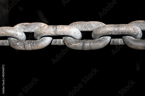 Old grunge chains link isolated on black background,relationship