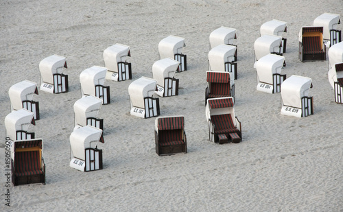 Obraz na płótnie Beach chairs in the evening. w salonie