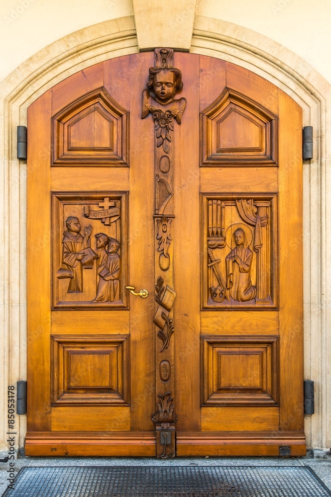 Old wooden door to the church in St. Gallen