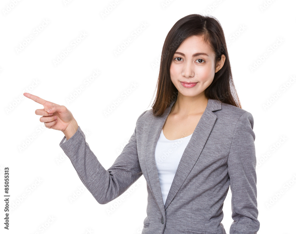Young businesswoman with finger point up Young businesswoman with finger point up