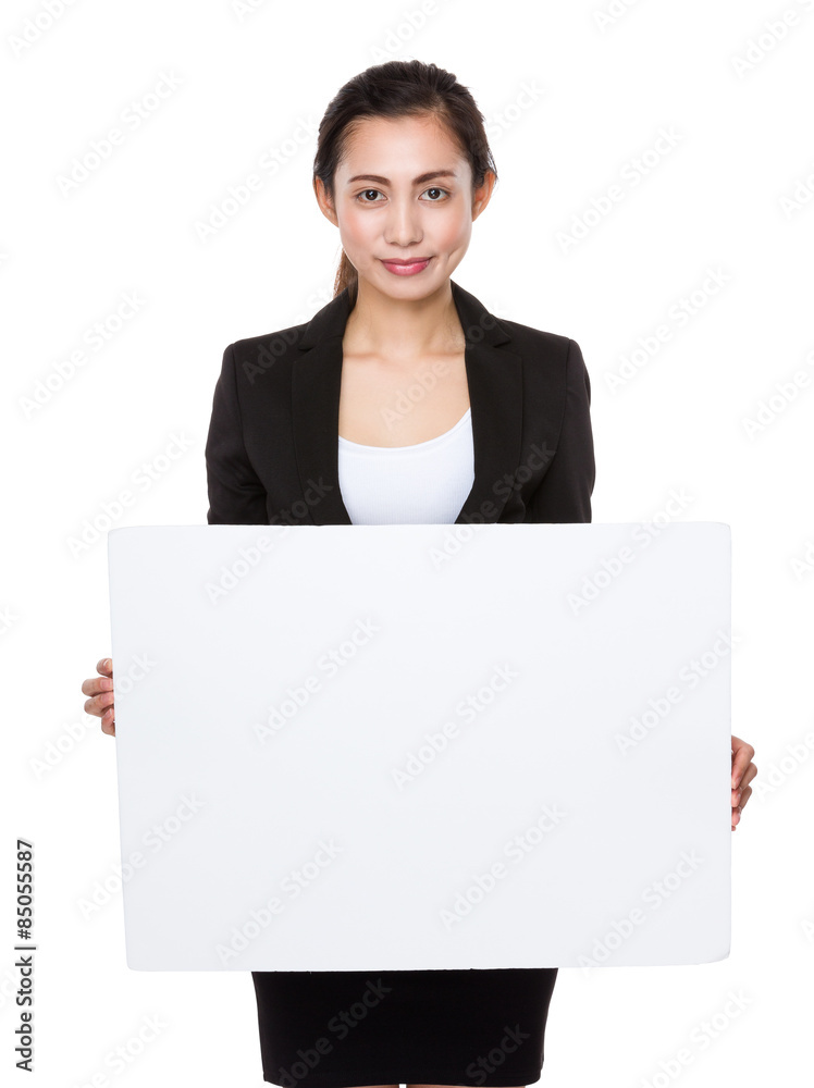 Businesswoman holding with white board Businesswoman holding with white board