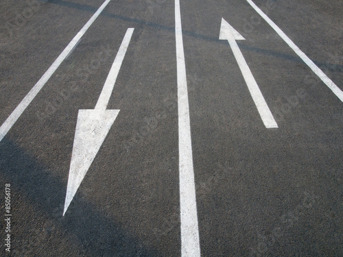 Wallpaper Mural Directional arrow signs on the asphalt road. Torontodigital.ca