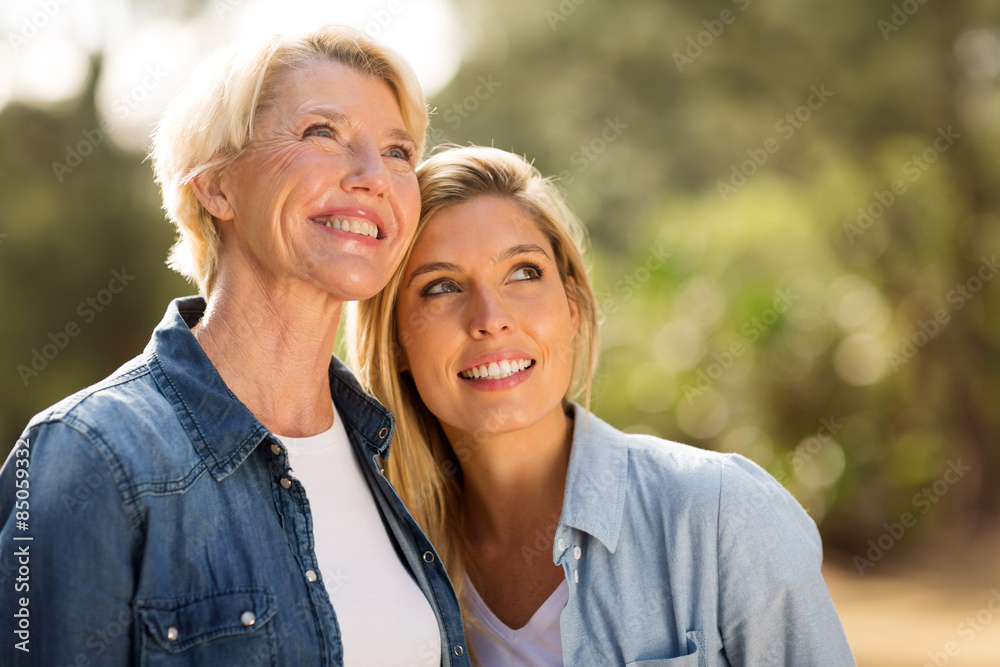 mother and daughter looking up mother and daughter looking up