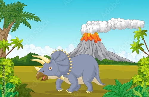 Prehistoric scene with triceratops cartoon and volcano