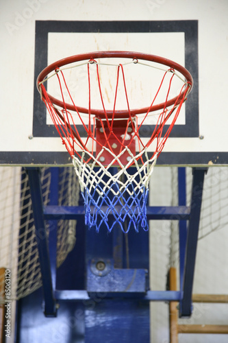 Basketball hoop in a high school gym