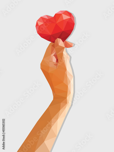 low poly polygon hand holding red heart vertical orientation