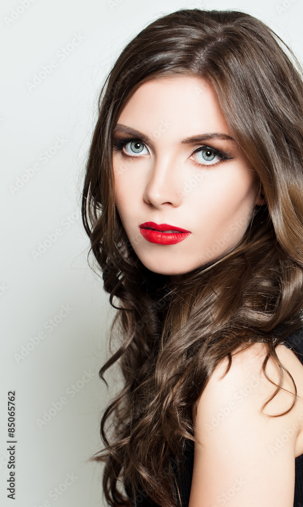 Woman with Fashion Makeup and Curly Dark Hair Woman with Fashion Makeup and Curly Dark Hair
