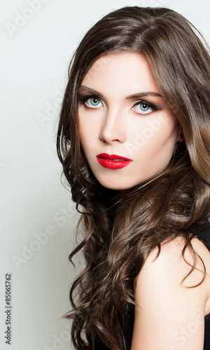 Woman with Fashion Makeup and Curly Dark Hair