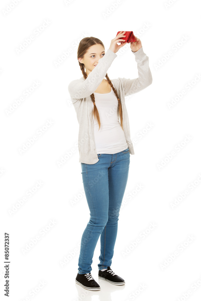 Young unhappy woman with empty purse. Young unhappy woman with empty purse.