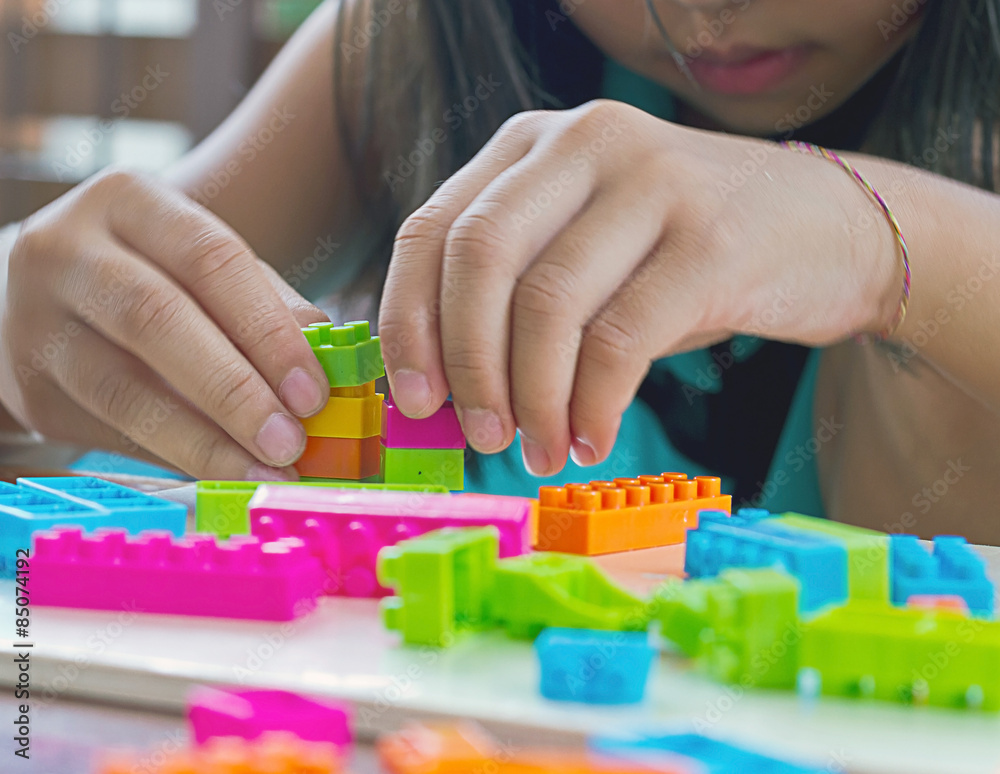 Hand assembled plastic blocks toy.