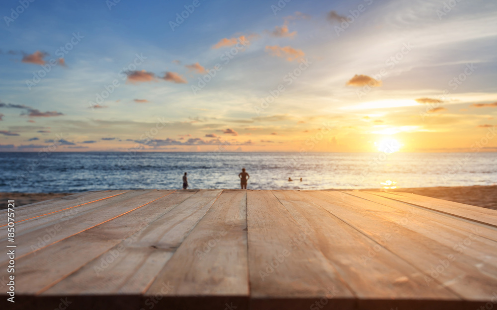 Top of old wooden table at sunset beach in Thailand