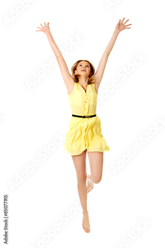 Young caucasian woman jumping