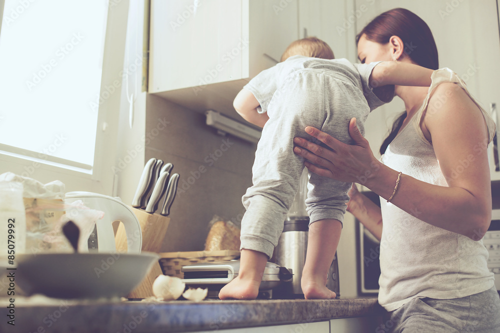 Mother with child cooking together
