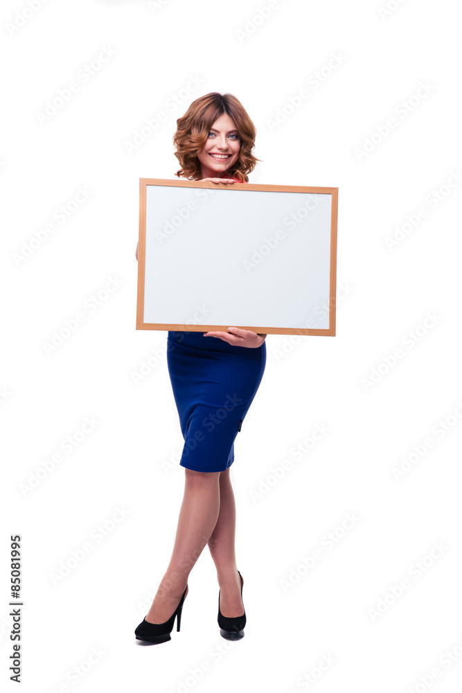 Smiling woman holding whiteboard Smiling woman holding whiteboard