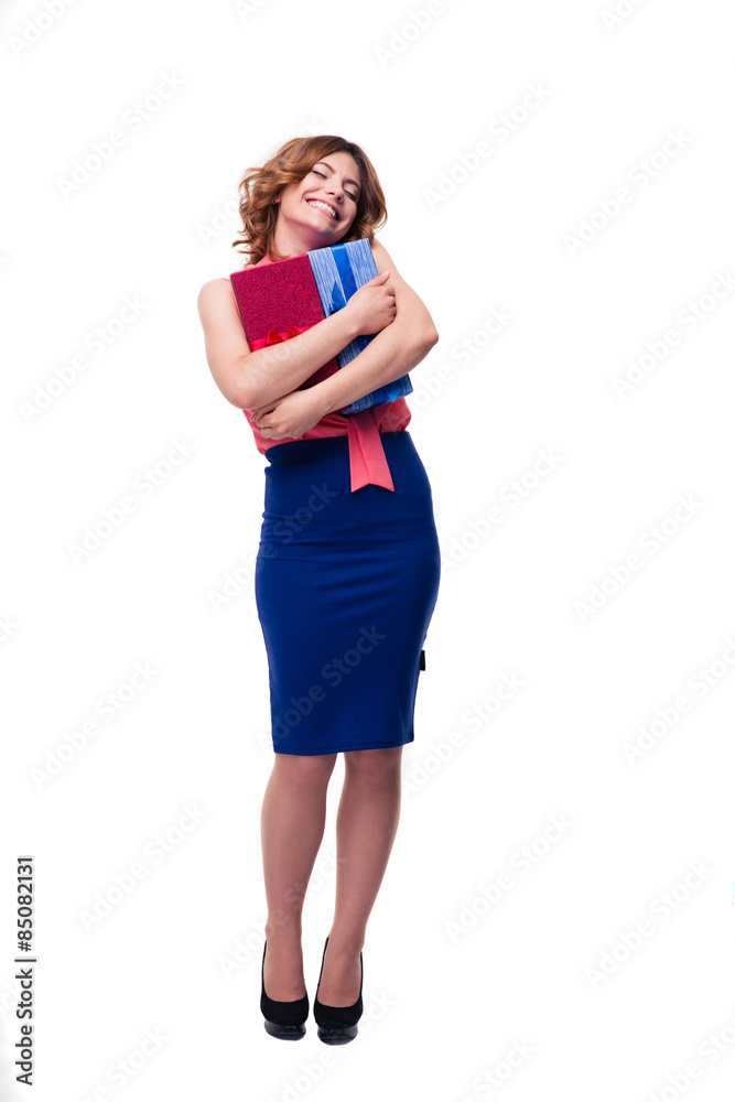 Full length portrait of a happy woman holding gifts
