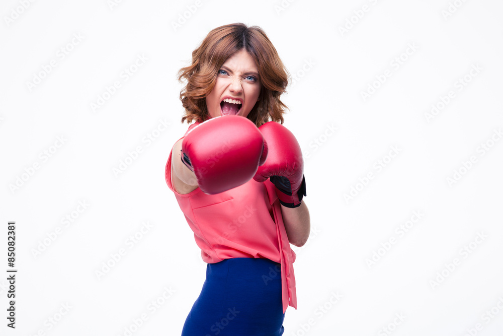 Angry elegant woman with boxing gloves fighting Angry elegant woman with boxing gloves fighting