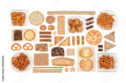 crackers and snacks on white background