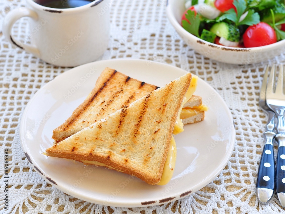 cheese sandwich with salad and coffee. breakfast cheese sandwich with salad and coffee. breakfast
