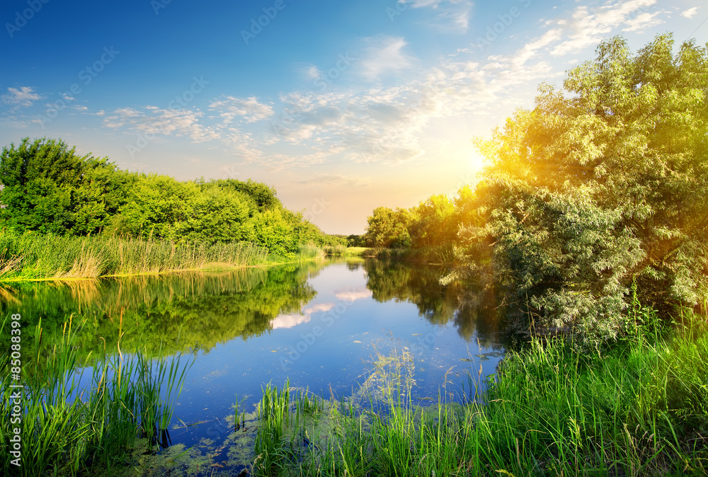 Yellow sunset over river