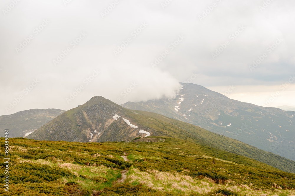 Rain clouds looming in the Carpathian mountains before the rain