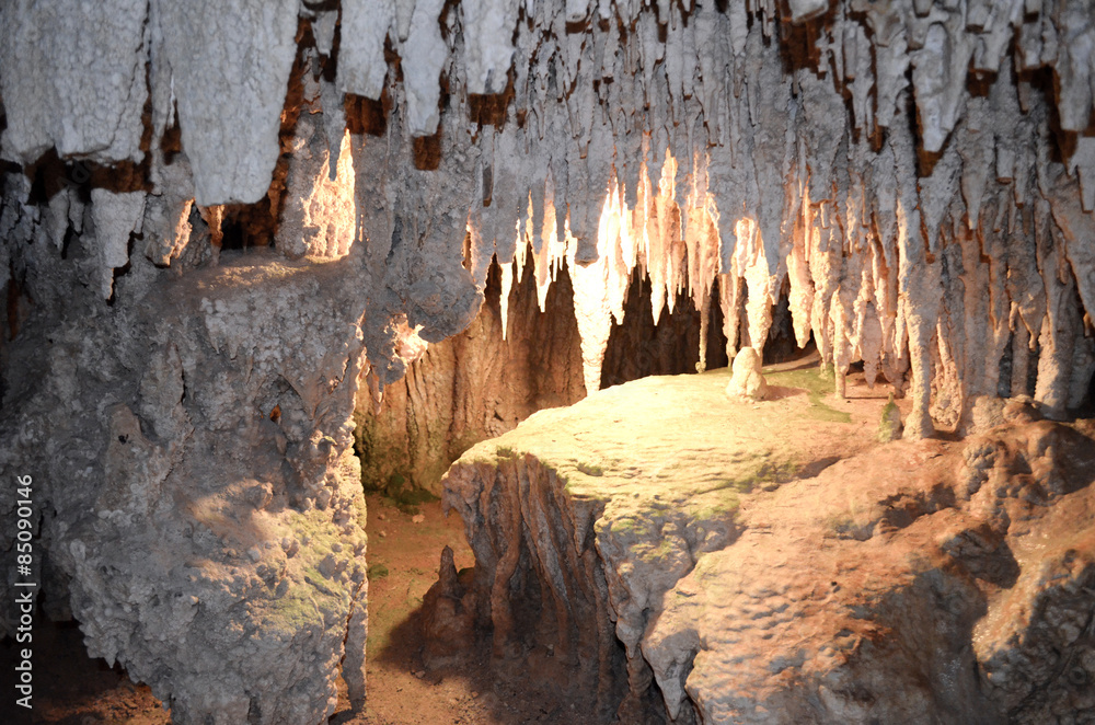STALACTITES HANGING FROM THE CAVE CEILING