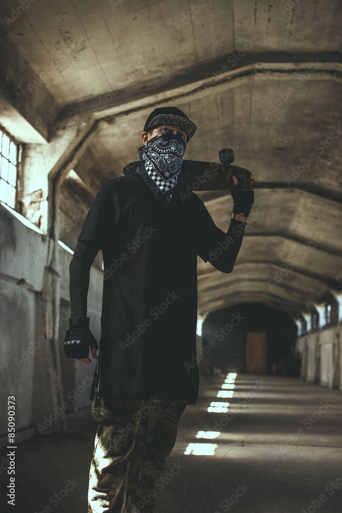 Guy in gangster clothing and face mask Stock Photo | Adobe Stock