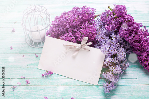 Background with  lilac flowers  and tag