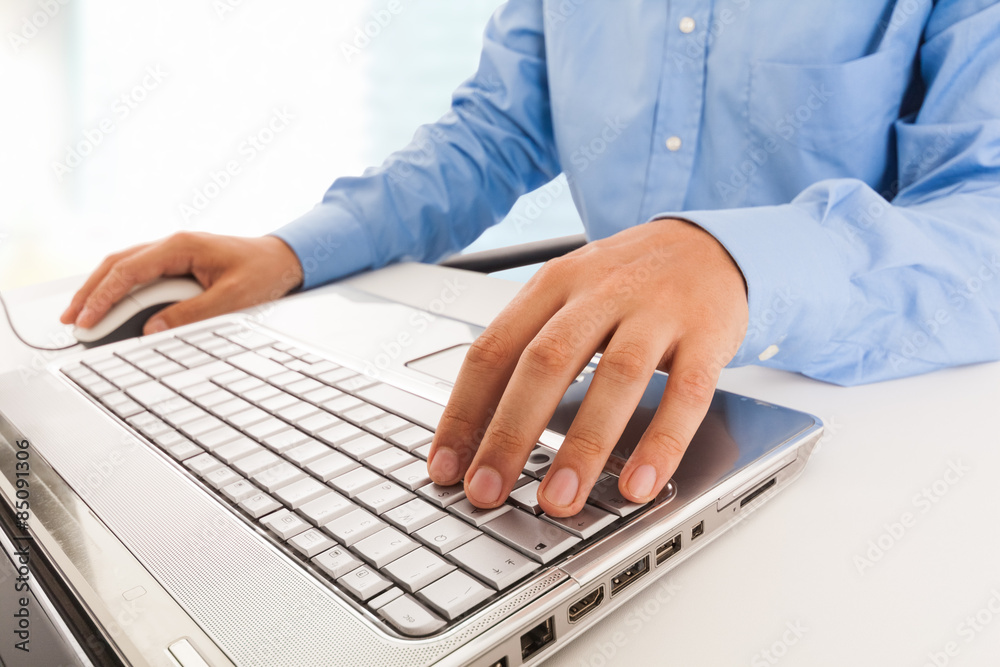 man using his laptop man using his laptop