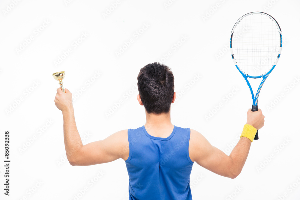 Man holding tennis racket and cup